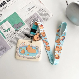 Detail of Capybara ID card holder with light blue printed lanyard and rubber pendant
