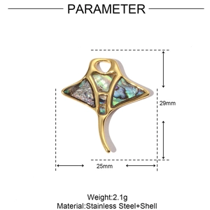 Detailed view of stingray pendant in gold-plated stainless steel with shell inlay