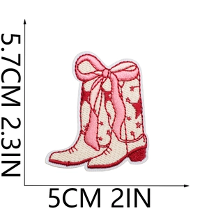 Detailed size view of pink embroidered cowboy boot patch measuring 5.7cm by 5cm in height