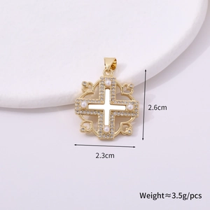 Golden cross pendant detailed view with pearls and rhinestones measuring 2.6cm by 2.3cm