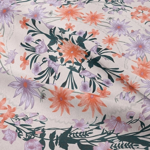 Macro shot of woven fabric texture with orange and purple floral bohemian patterns