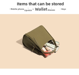 Internal view of olive green leather bucket bag showing capacity for daily essentials