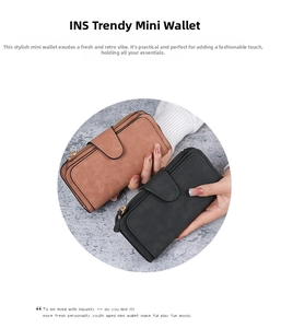 Close-up of long buckle wallet featuring soft matte leather and secure metal zipper detail