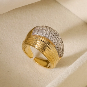 Two-tone plated geometric open ring with textured gold finish and pavé zircon stones