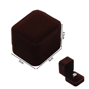 Detail view of small brown velvet ring box showing precise dimensions and interior space