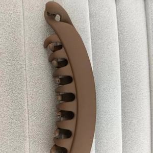 Minimalist large brown matte banana hair clip in vertical style for women ponytails