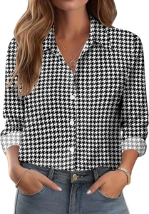 Detail of classic black and white houndstooth print long sleeve button-up blouse