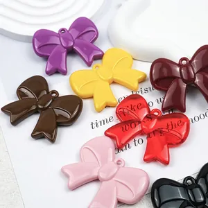Colorful acrylic bow pendants with hanging holes for DIY jewelry and bag accessories