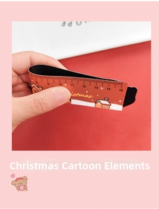 Detailed view of 15cm Christmas ruler showing flexible magnetic material and cartoon house design