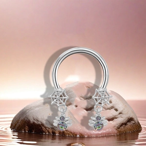 Silver stainless steel horseshoe nose ring featuring spider web pendants and colorful rhinestones