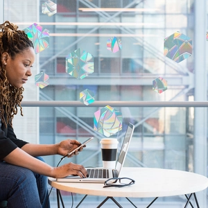 Rainbow prism hexagonal window film creates colorful light effects in a modern home office