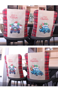 Detail der Weihnachts-Stuhlhusse mit blauem LKW-Druck und festlichem Karomuster-Rand