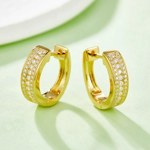 Elegant s925 sterling silver hoop earrings with three rows of pavé moissanite in gold