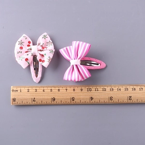 Pink cherry pattern and striped bow hair clips for girls with measurement ruler