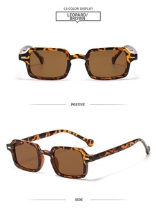 Detalle de gafas de sol cuadradas de leopardo con lentes marrones y detalles metálicos