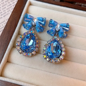 Elegant blue crystal bowknot drop earrings with silver needle on velvet lining