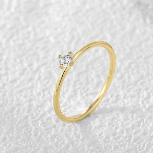 Classic minimalist 18K gold plated four-prong zircon ring for women with elegant design