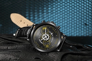 Macro shot of YOLAKO fashion watch with black dial, gold accents and leather strap