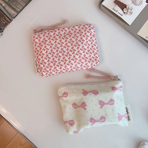 Floral cotton pouch detail with zipper closure and hand made simple wish woven label