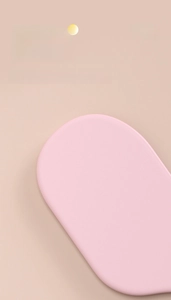 Close-up of pink bed sheet tucker tool with smooth edges for effortless bed making