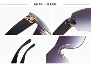 Detail of purple gradient lenses with gold butterfly metal accents and sleek black temples
