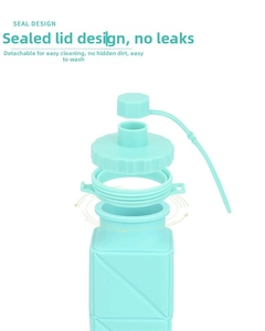 Seal design detail of mint green collapsible silicone water bottle showing leakproof components