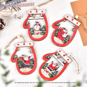 Detail of wooden Christmas glove ornaments featuring reindeer and snowman laser-cut designs