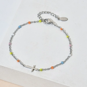 Detail view of silver stainless steel cross bracelet with colorful enamel beads and adjustable chain