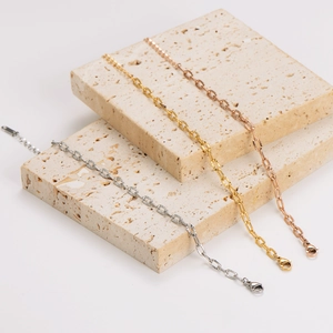 Embossed stainless steel oval link chain bracelet in gold, rose gold and silver finishes