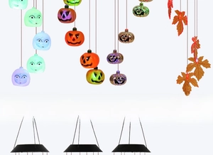 Solar Halloween wind chime lights showing pumpkin, ghost face, and maple leaf styles