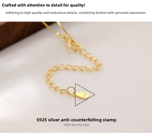 Macro shot of S925 sterling silver chain with hallmark and polished gold finish