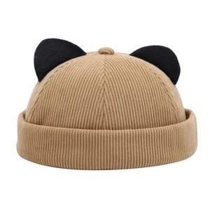 Khaki corduroy sailor cap featuring cute black cat ears with minimalist textures