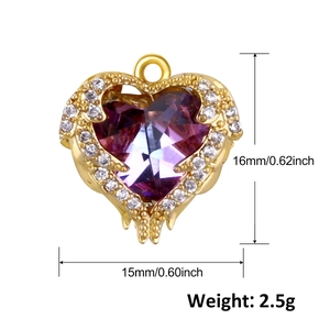 Detailed view of a gold heart pendant featuring a faceted purple stone and clear crystals