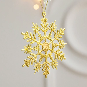 Golden glitter snowflake ornament with hanging string for Christmas tree decoration