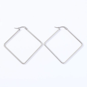 Detailed close-up of large geometric square stainless steel hoop earrings in silver finish