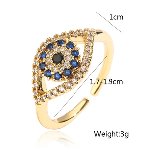 Macro view of adjustable gold evil eye ring showing dimensions 1cm height and 3g weight