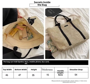 Detailed size chart for large woven straw tote bag with black rope straps