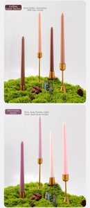 Detalle de velas cónicas de 25 cm de colores en elegantes candelabros dorados