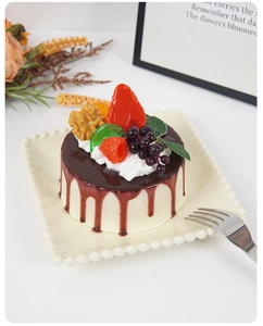 Detailed realistic 10cm chocolate mousse cake model with strawberry and grape toppings