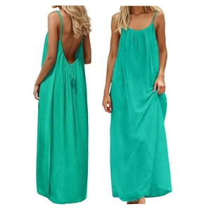 Macro detail of emerald green backless maxi dress showing summer beach strap design