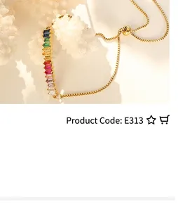 Close-up of gold bolo bracelet featuring rainbow baguette-cut stones and adjustable bead