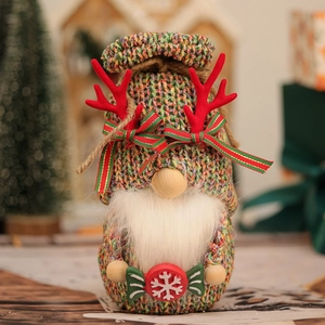 Charming knitted Christmas gnome plush doll with red antlers and colorful striped hat ornament