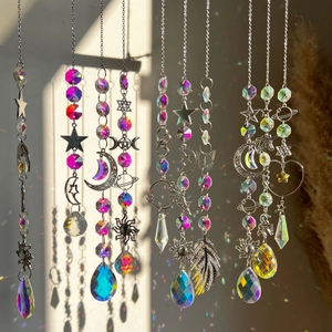 Set of 7 celestial crystal suncatchers with metal moon and star charms for garden decor