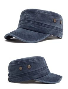 Detail view of washed cotton cadet cap with metal eyelets and adjustable buckle