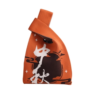 Borsa a mano in maglia per la festa di metà autunno con motivi arancioni festivi