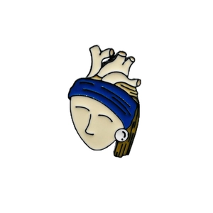 Artistic enamel pin merging anatomical heart design with Girl with a Pearl Earring style