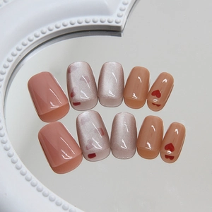Cat eye press-on nails with red heart designs on short ballet tips 10-piece set