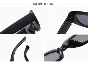 Detail view of black cat-eye sunglasses featuring metal hinges and integrated nose pads