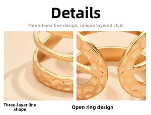 Close-up of golden multi-layer adjustable ring with hammered texture and vintage finish