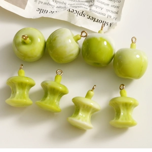 Green resin apple and core charms with metal loops for DIY jewelry making and crafts